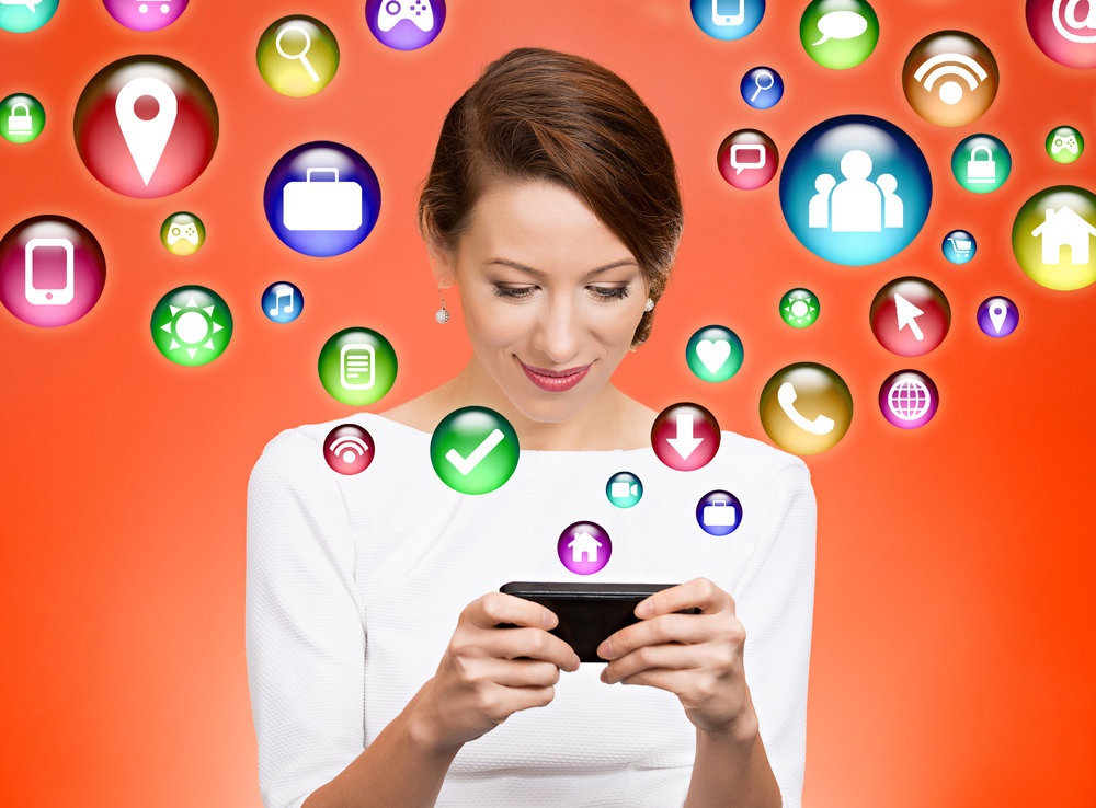 woman using smart phone multimedia icons flying out of screen