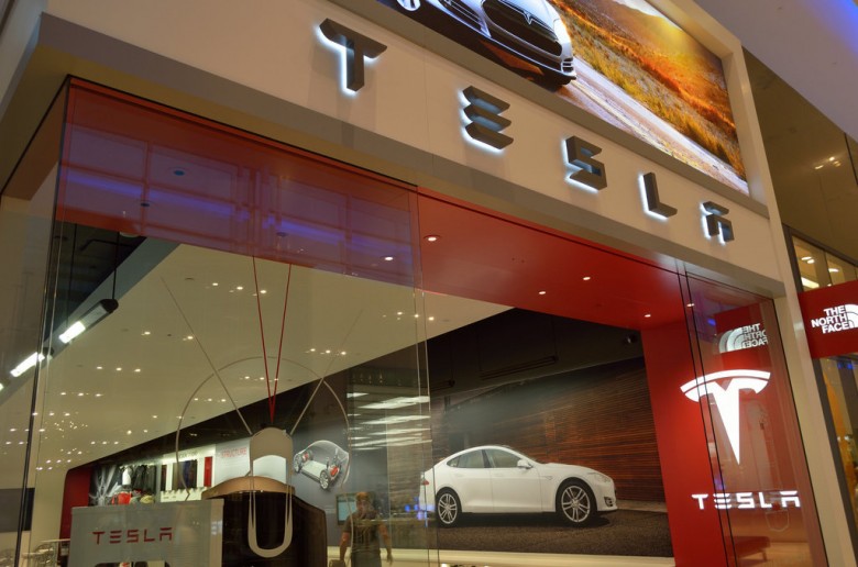 tesla motors fires hundreds of employees citing bad performance as the reason
